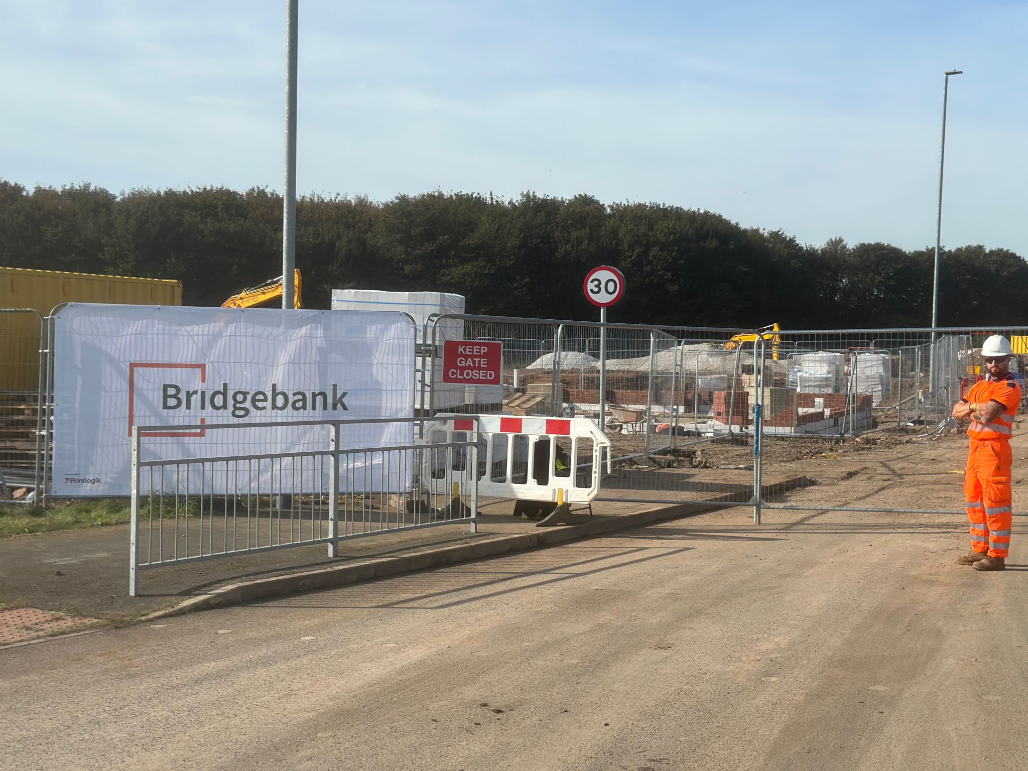 Heras fencing banner installed on perimeter fencing