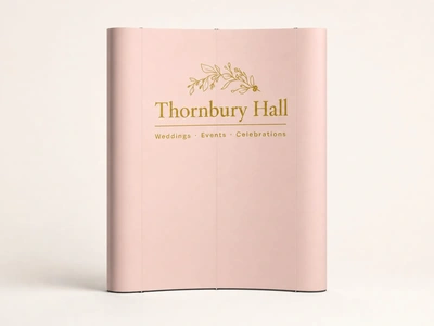 Pale pink traditional pop-up display lite for Thornbury Hall weddings against a plain backdrop