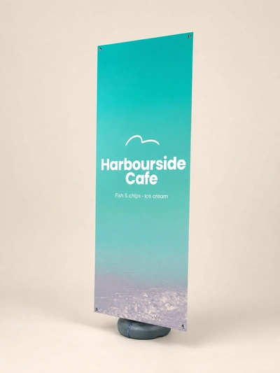 Teal outdoor water base roller banner for Harbourside Cafe on a plain studio backdrop