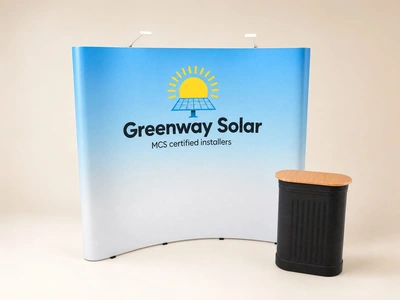 Curved traditional pop-up display for Greenway Solar with a black counter against a plain backdrop